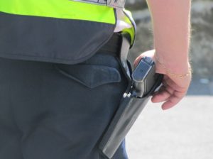 Police officer with gun